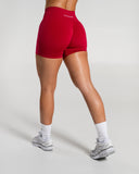 Amplify Mid Rise Short in Scarlet – women's mid-rise seamless compression shorts